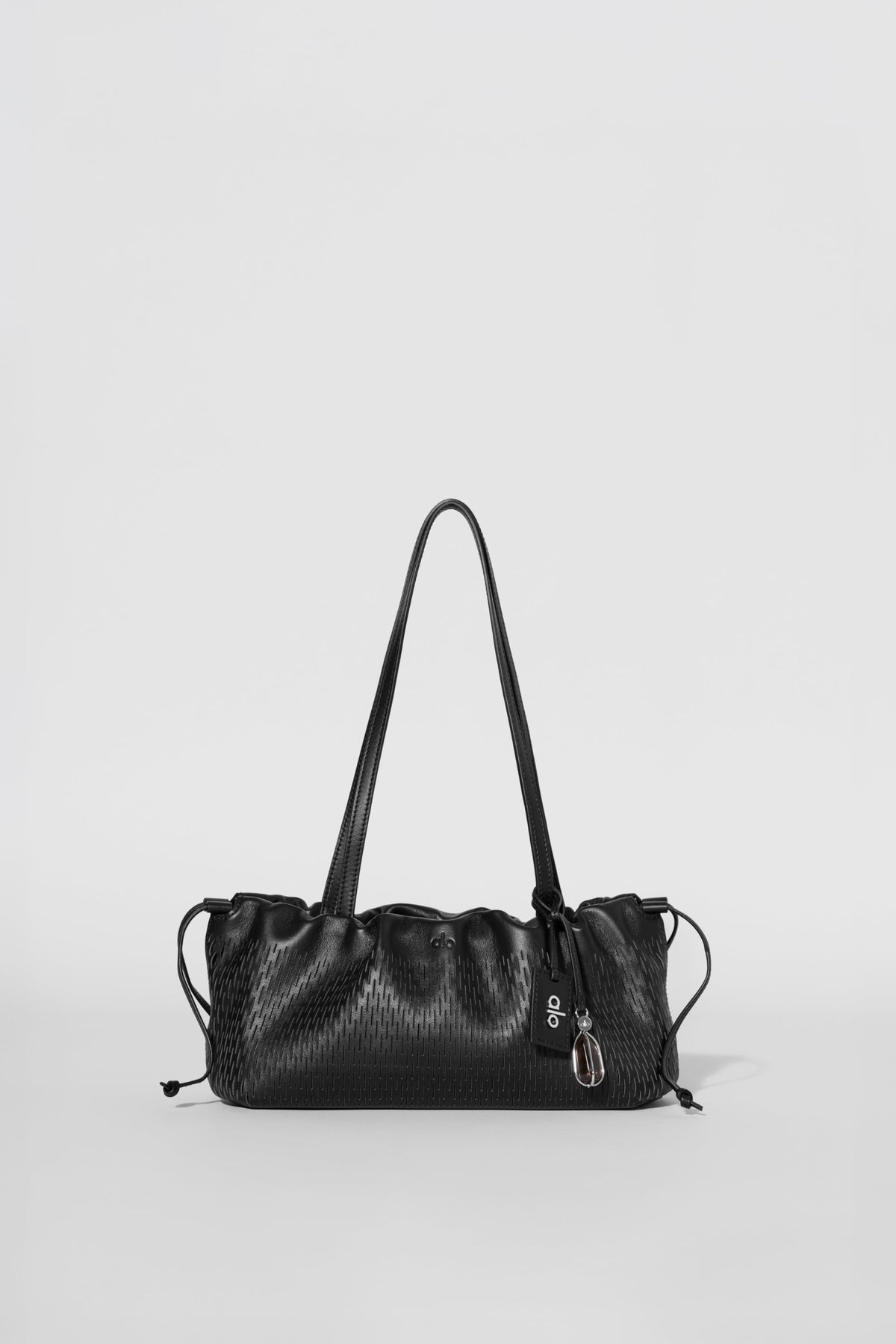 Mini-sac à cordon ALO Unwind en cuir ajouré - Cuir ajouré noir