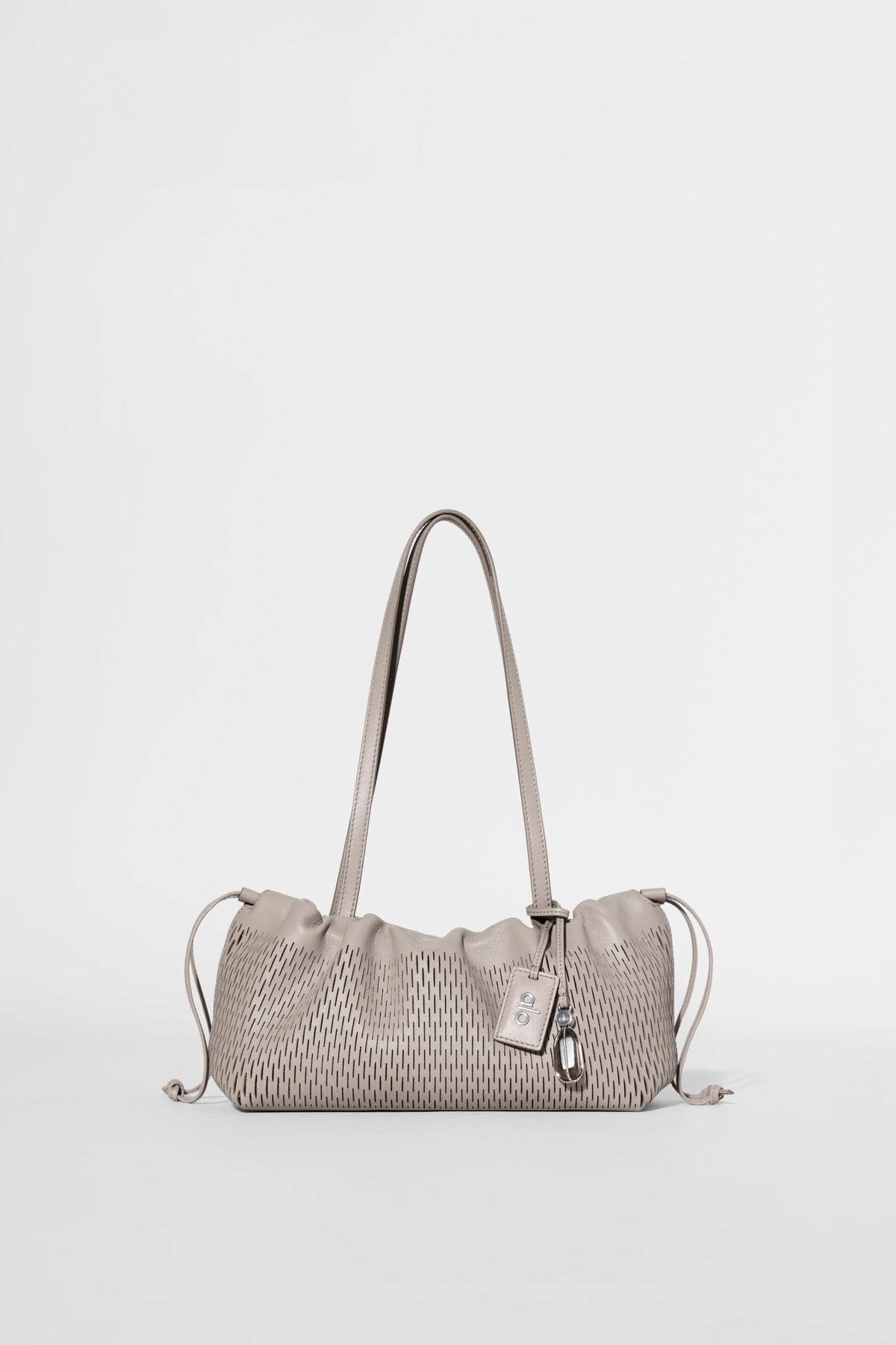 Mini-sac à cordon ALO Unwind en cuir ajouré - Cuir ajouré gravier chaud