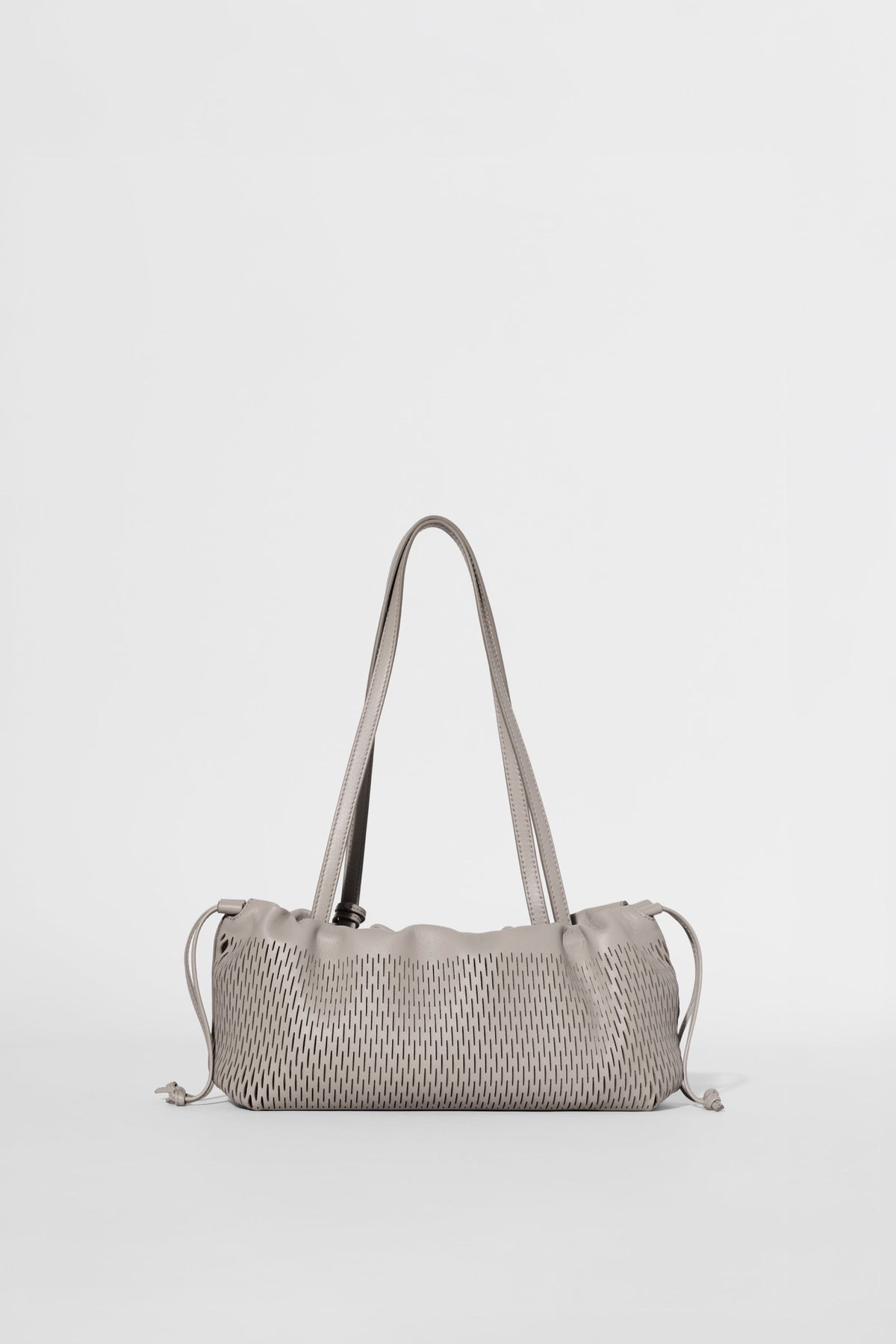 Mini-sac à cordon ALO Unwind en cuir ajouré - Cuir ajouré gravier chaud