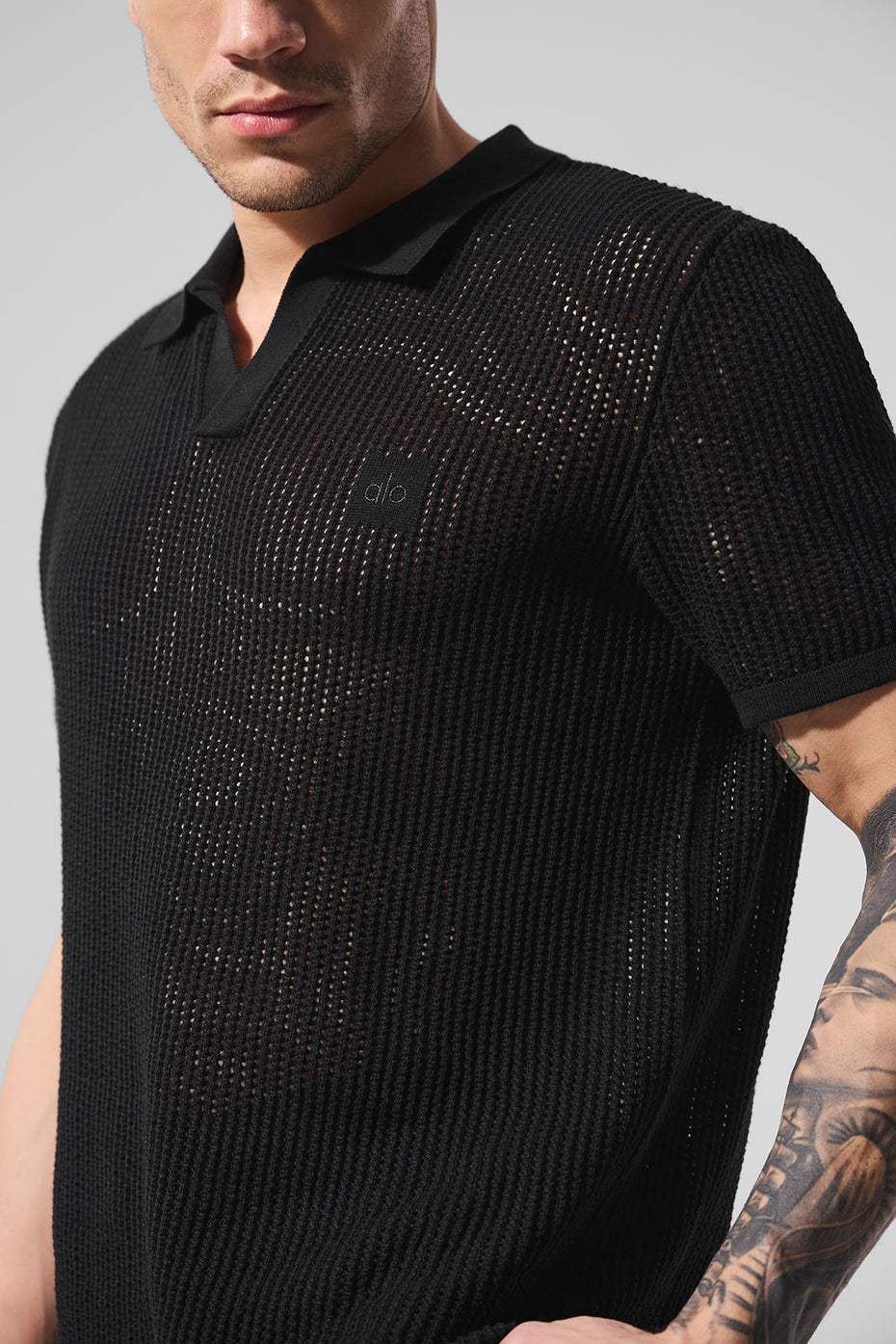Polo en maille ajourée - Noir