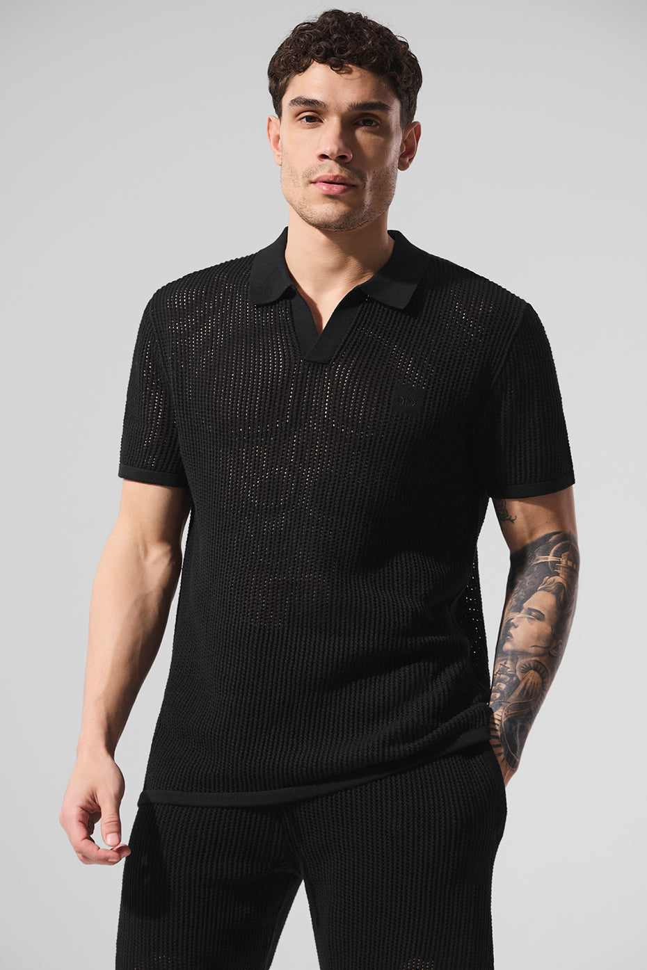 Polo en maille ajourée - Noir