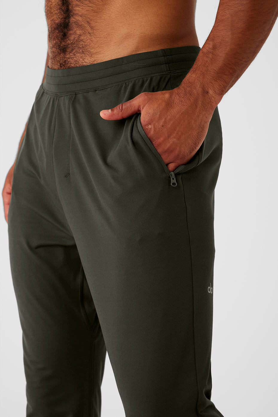 Pantalon technique Conquer React - Vert furtif
