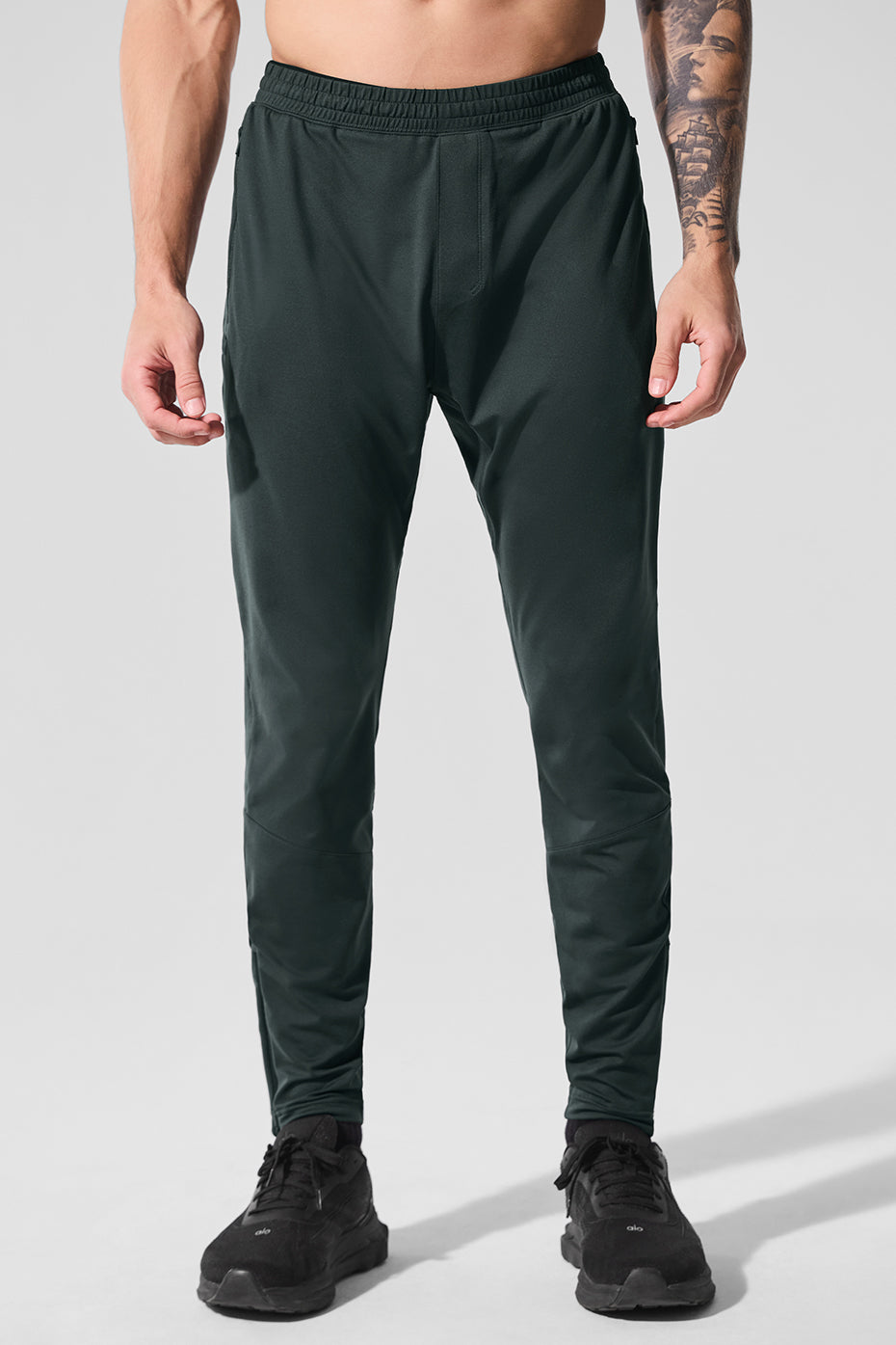 Pantalon technique Conquer React - Vert charbon