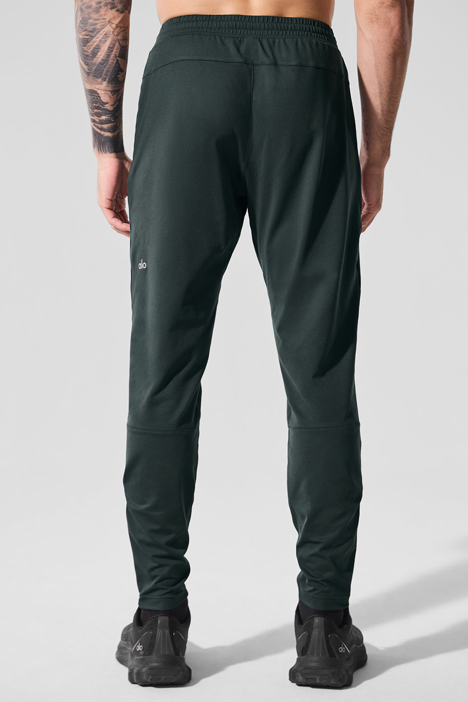 Pantalon technique Conquer React - Vert charbon