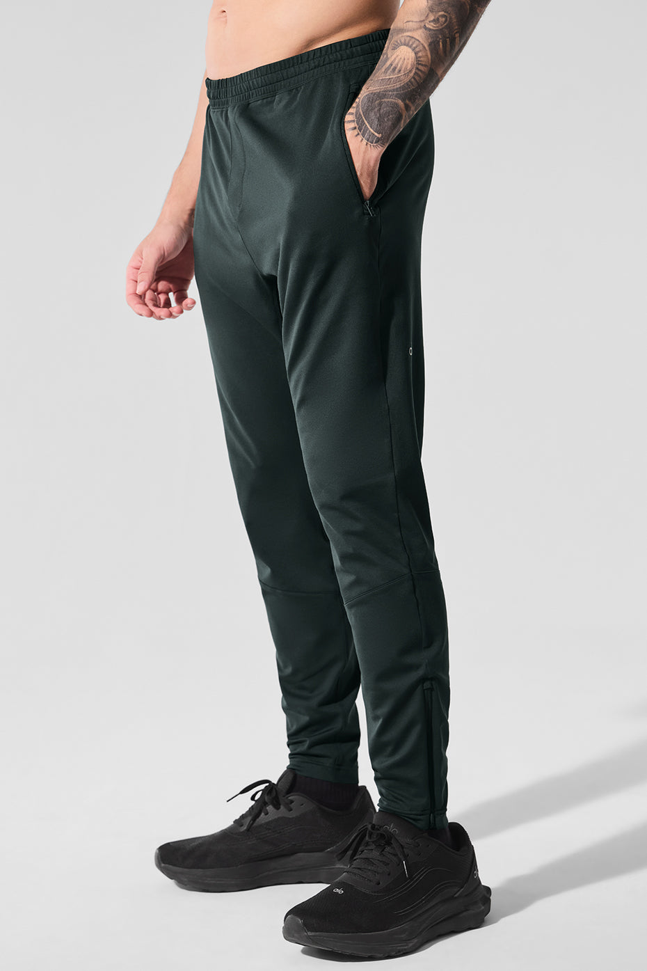 Pantalon technique Conquer React - Vert charbon