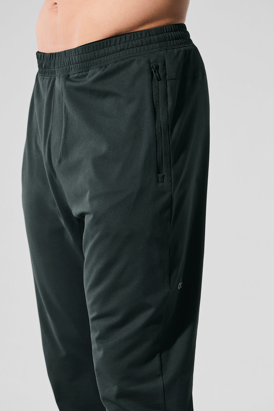 Pantalon technique Conquer React - Vert charbon
