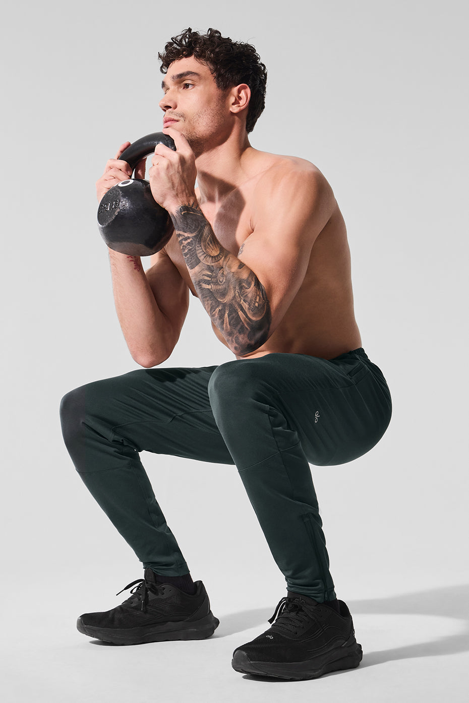 Pantalon technique Conquer React - Vert charbon