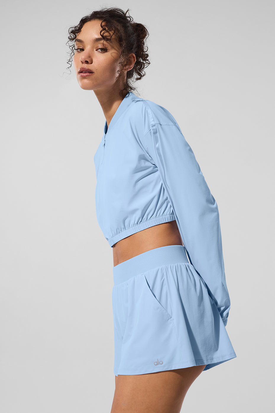 Haut de superposition court entièrement zippé Breezy - Bleu coquillage