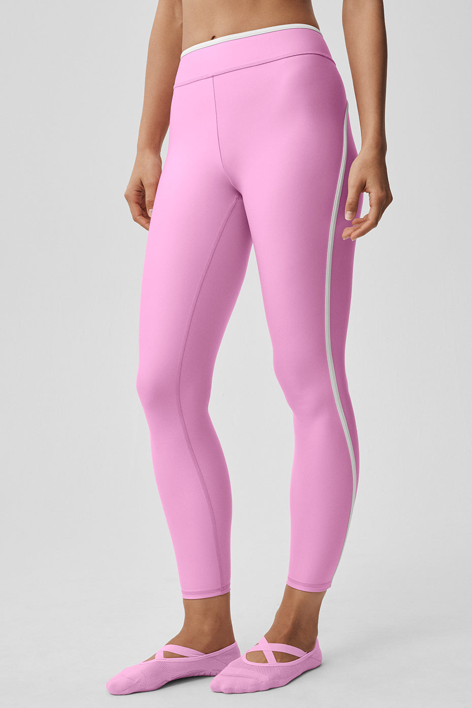 Legging 7/8 taille haute Airlift Charger - Rose cœur de bonbon/Blanc
