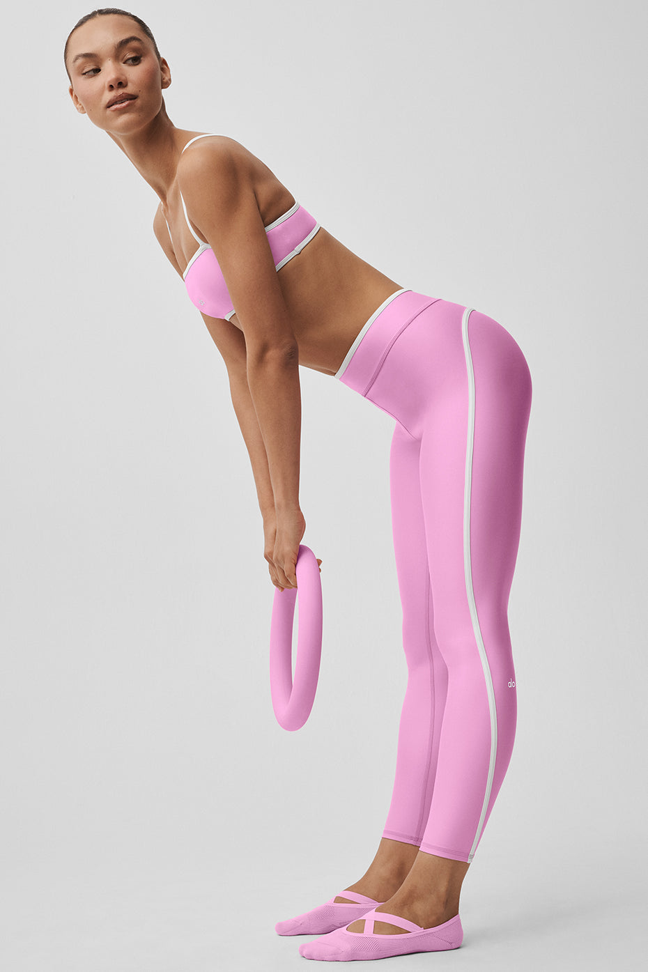 Legging 7/8 taille haute Airlift Charger - Rose cœur de bonbon/Blanc